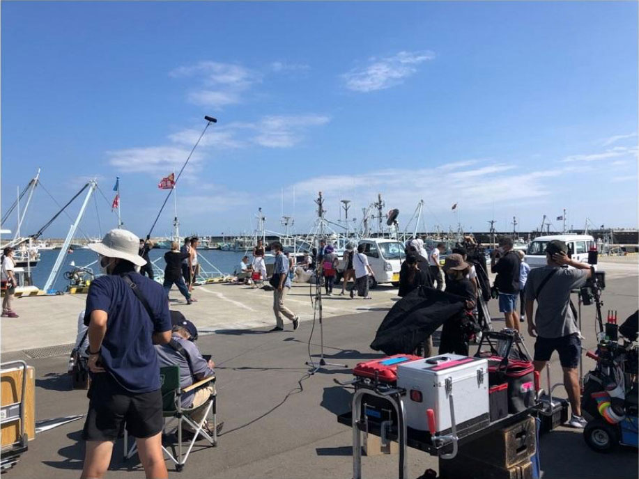 Residents taking part in the filming of “Haw” at Ukedo fishing port in the town of Namie, Fukushima prefecture.